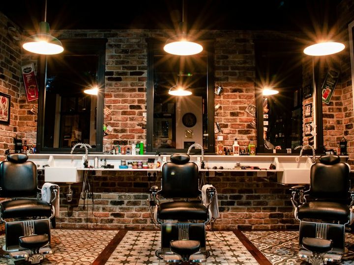 Barbershop with leather chairs and mirrors